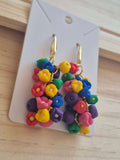 Colorful bead tassel dangle earrings with gold-tone hooks, on display card